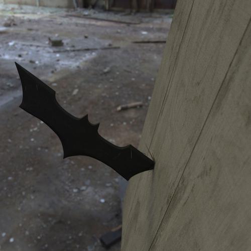 Batarang stuck in a wall preview image